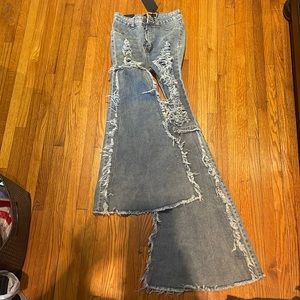 Flared Bottomed Ripped Jeans